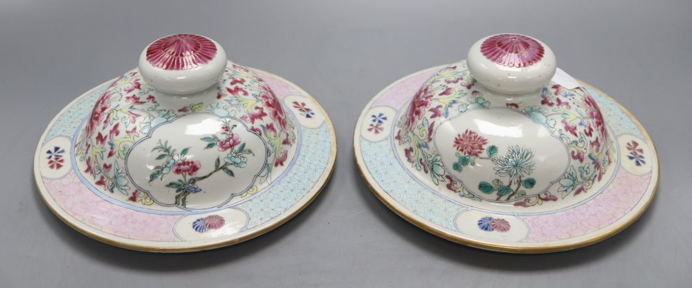 A pair of late 19th century Chinese famille rose covers, diameter 20.5cm